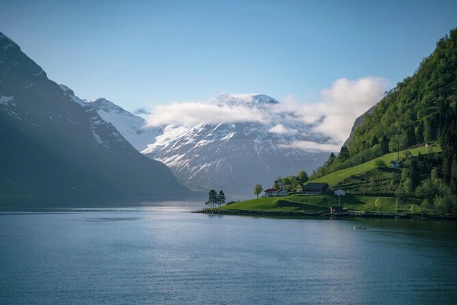 All About the Fjords in One Tour by Boat and Bus from Ålesund - Leaving Ålesund through the archipelago