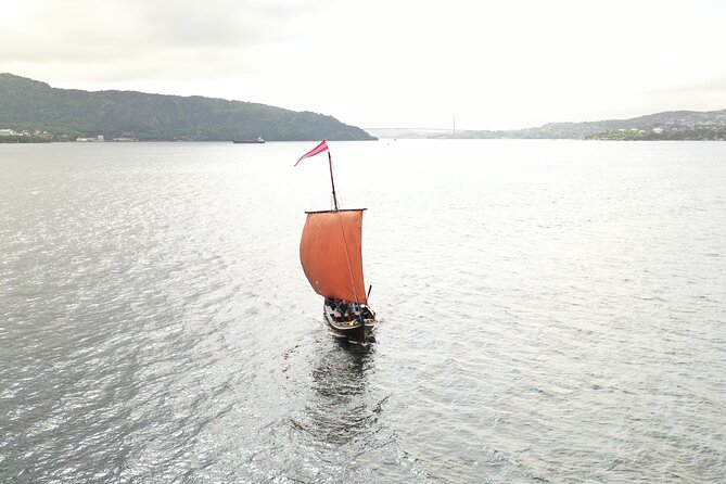 Bergen Fjord Experience Aboard Viking-style Ship - Raising the sail and trying the fishing line