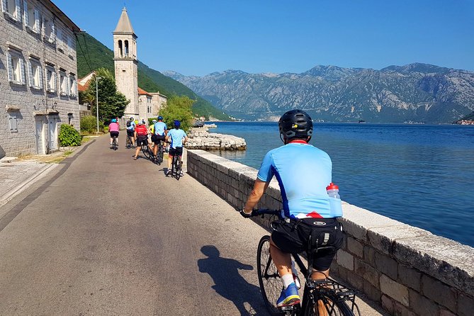 Bike tour - Kotor Bay circle and visit Our Lady of the Rock - Starting at the Sea Gate in Kotor