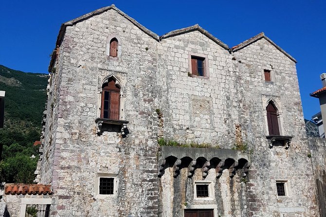 Bike tour - Kotor Bay circle and visit Our Lady of the Rock - Crossing the bay on the Kamenari ferry
