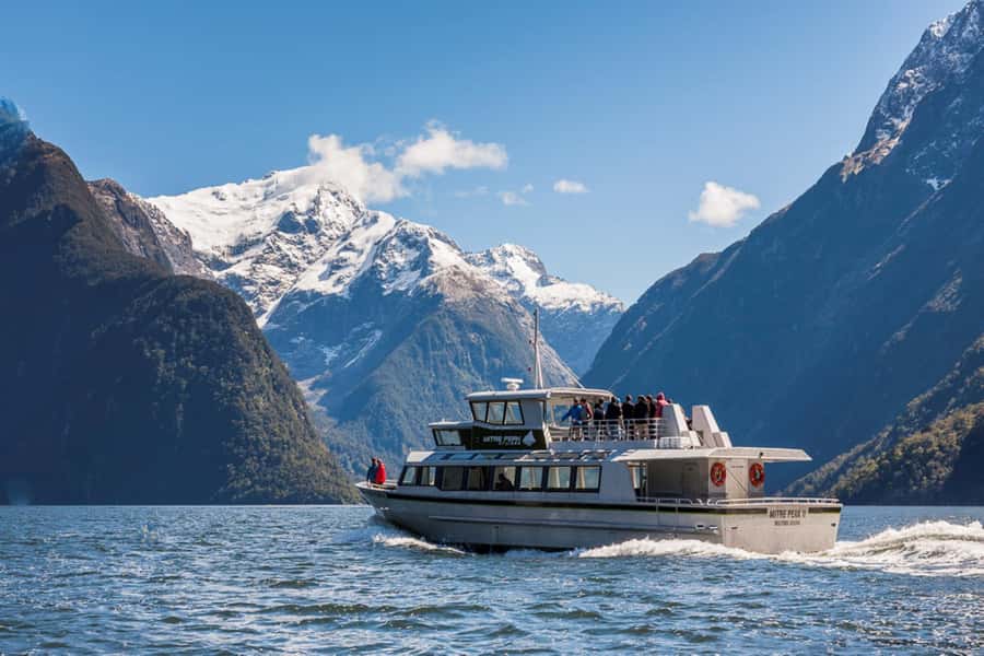 From Queenstown: Milford Sound Day Trip with Cruise & Flight - Mitre Peak, waterfalls, and wildlife on the water