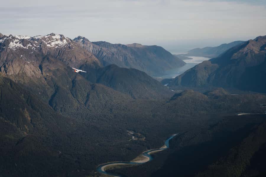 From Queenstown: Milford Sound Full-Day Trip by Plane & Boat - Two hours on the water beneath Mitre Peak