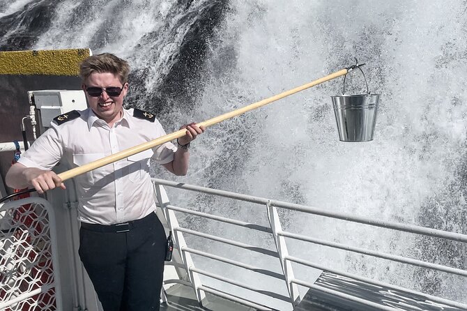 Geiranger Fjord Tour with Waterfall Tasting - Indoor comfort, outdoor views, and rainy weather