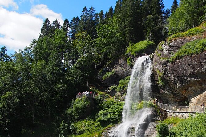 Guided tour to Hardanger Fjord, Waterfalls and Ferry Crossing - Utne offers old wooden houses and quiet views