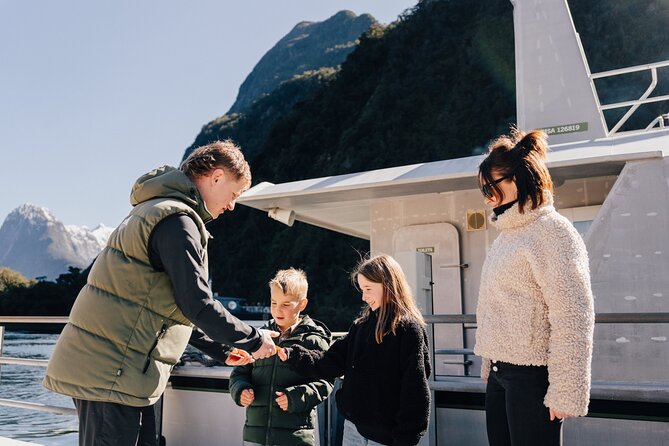 Milford Sound Cruise with Round-Trip Flights from Queenstown - Landing beside Milford Sound and boarding the boat
