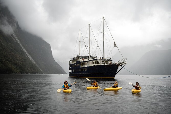 Milford Sound Mariner Overnight Cruise - Cruising past Mitre Peak and the waterfalls