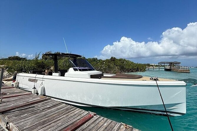 Private Morning Tour Fjord 38 Ben - Half Moon Bay brings shallow turquoise water