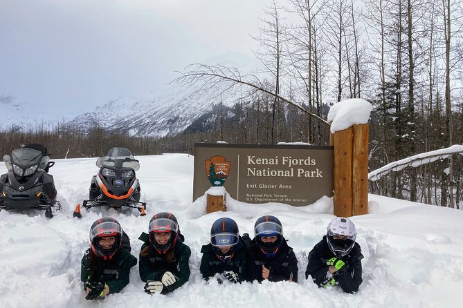 Snowmobile and Snowshoe Dual Adventure in Kenai Fjords NP - Riding toward Exit Glacier by snowmobile